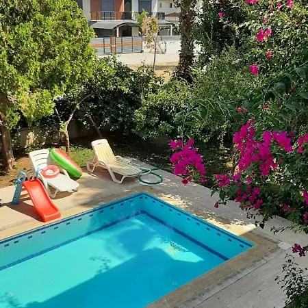 A 5-bedroom Duplex With A Swimming Pool And A Garden